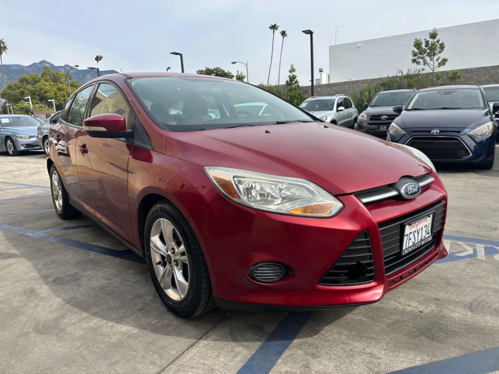 2014 RED /Gray Ford Focus Cloth (1FADP3K24EL) with an 4 Cylinders engine, Automatic transmission, located at 30 S. Berkeley Avenue, Pasadena, CA, 91107, (626) 248-7567, 34.145447, -118.109398 - Good Value! Good MPG! - Photo #2